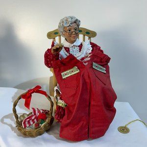 Possible Dreams Clothtique Mrs. Claus in rocking chair mending Santa's britches